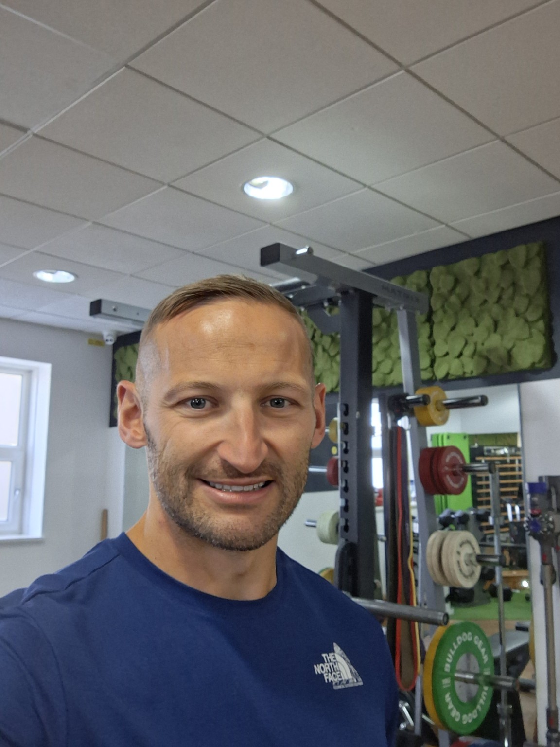 Steve Horsman smiling in his gym